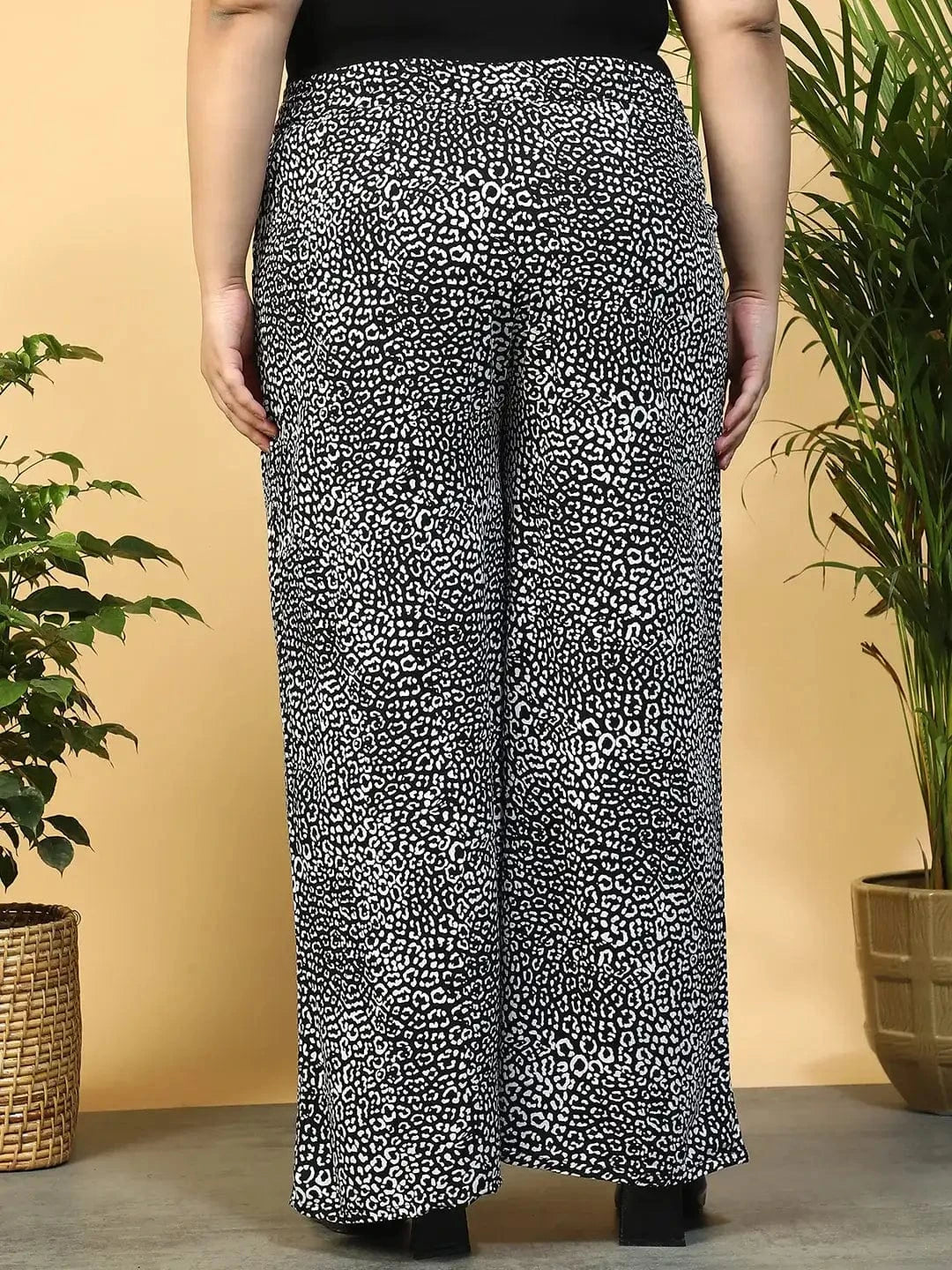 Moonless Black Animal Print Flared Elasticated Waist With Tie-Up Detail Plus Size Women Pant