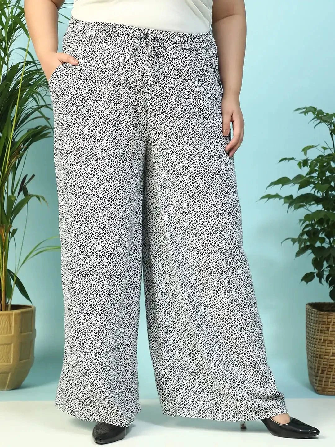 Toned White Animal Print Flared Elasticated Waist With Up Detail Plus Size Women Pant