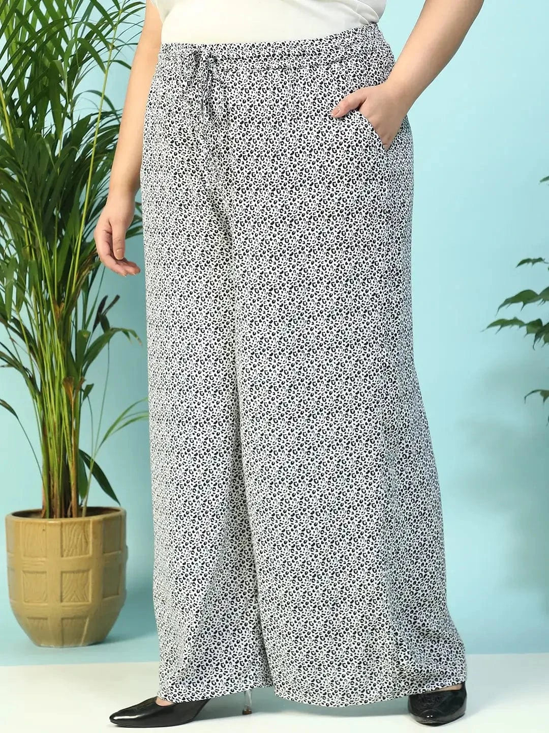 Toned White Animal Print Flared Elasticated Waist With Up Detail Plus Size Women Pant