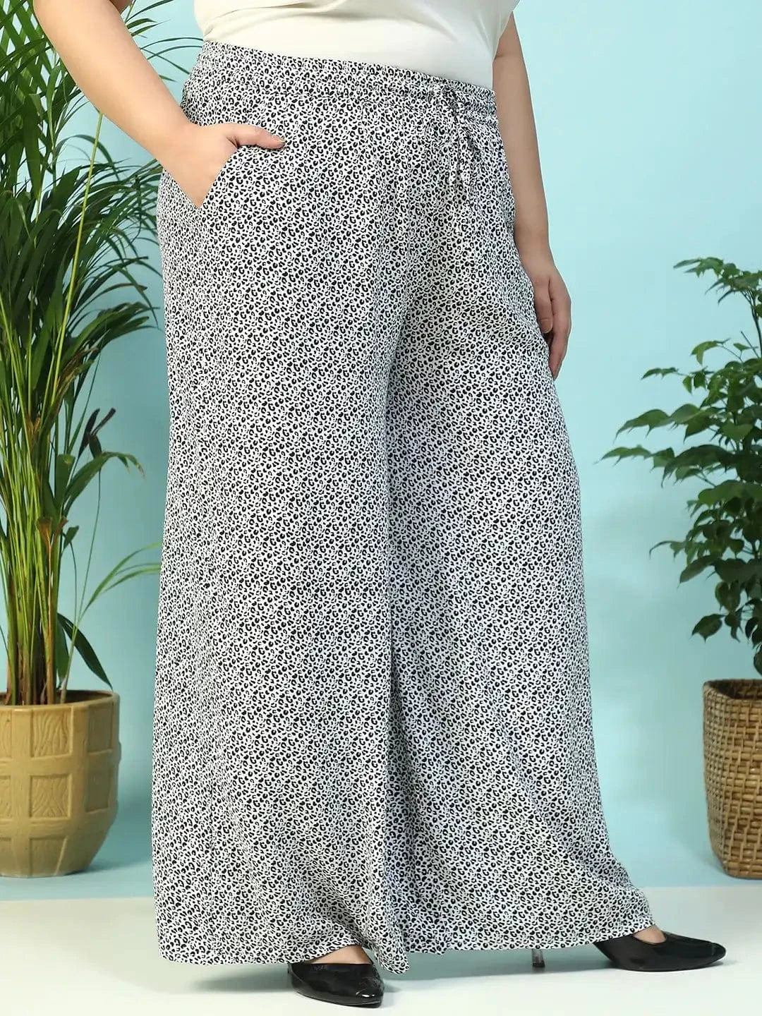 Toned White Animal Print Flared Elasticated Waist With Up Detail Plus Size Women Pant