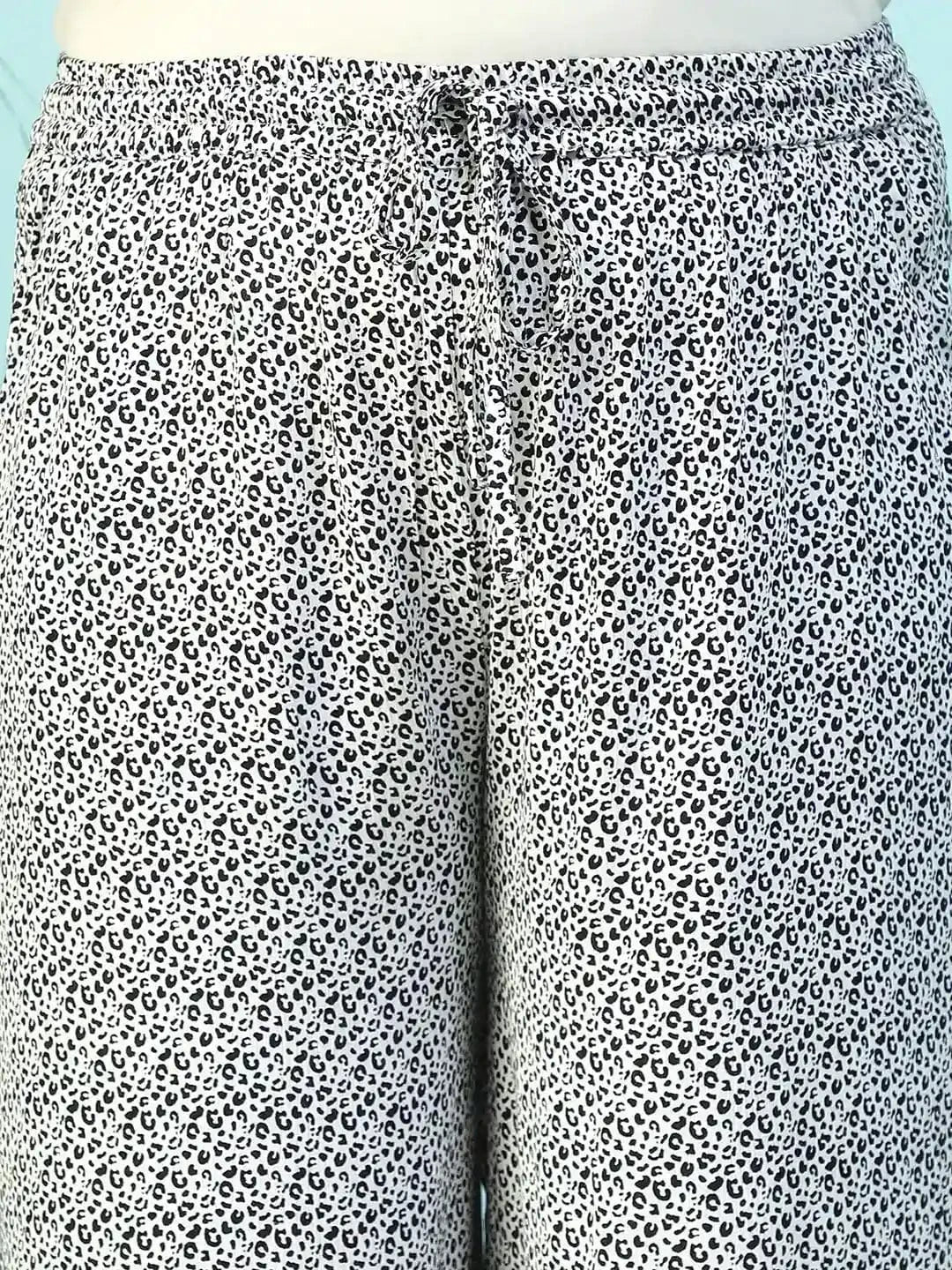 Toned White Animal Print Flared Elasticated Waist With Up Detail Plus Size Women Pant