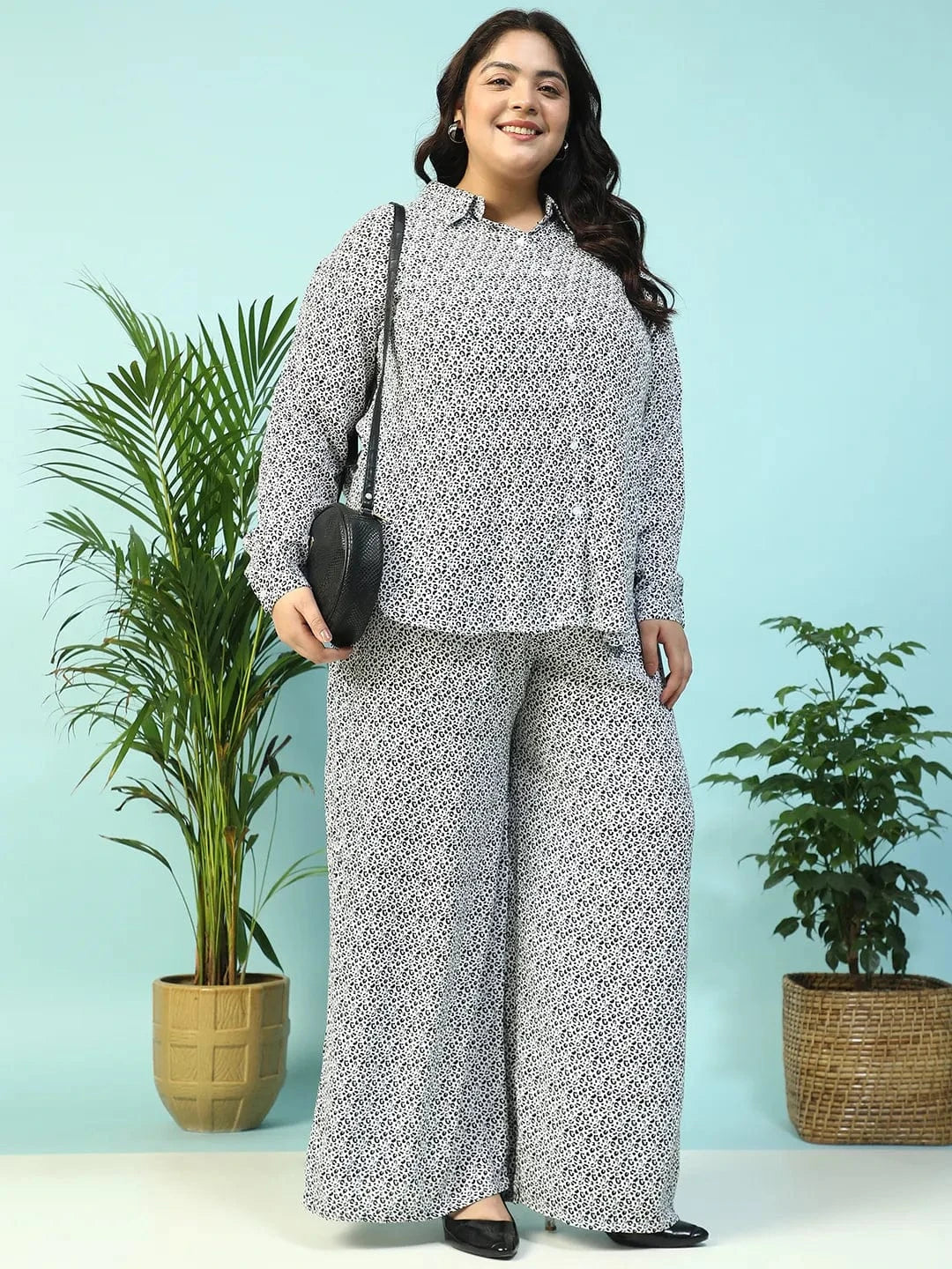 Toned White Animal Print Flared Elasticated Waist With Up Detail Plus Size Women Pant