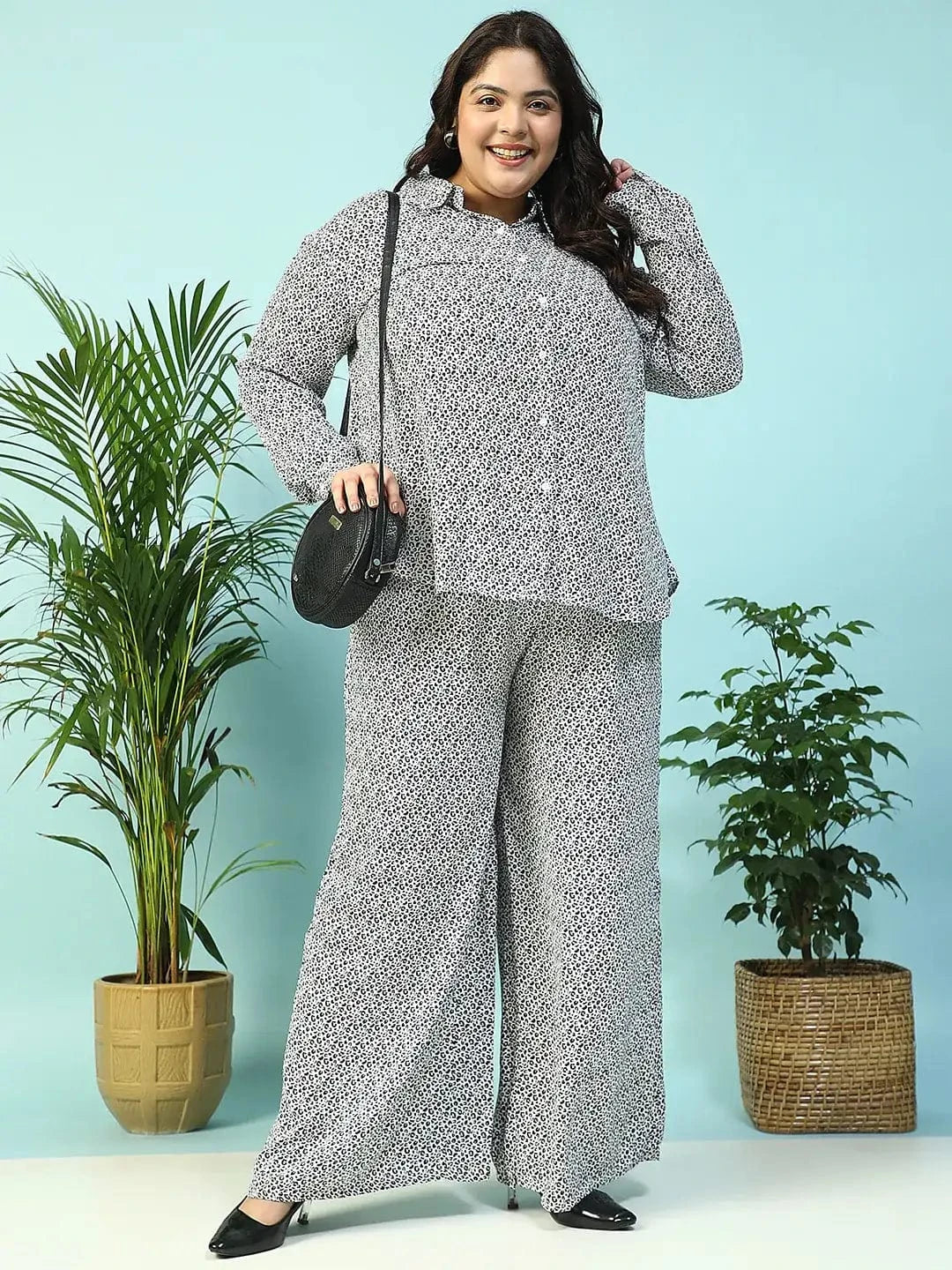 Toned White Animal Print Flared Elasticated Waist With Up Detail Plus Size Women Pant