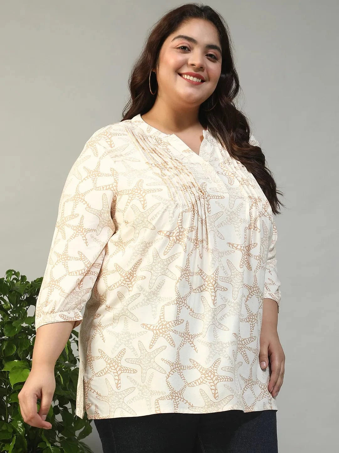 Ethereal Beige Floral Rayon Print Plus Size Women Top With Button Front, Pleated Details, And Long Sleeves.