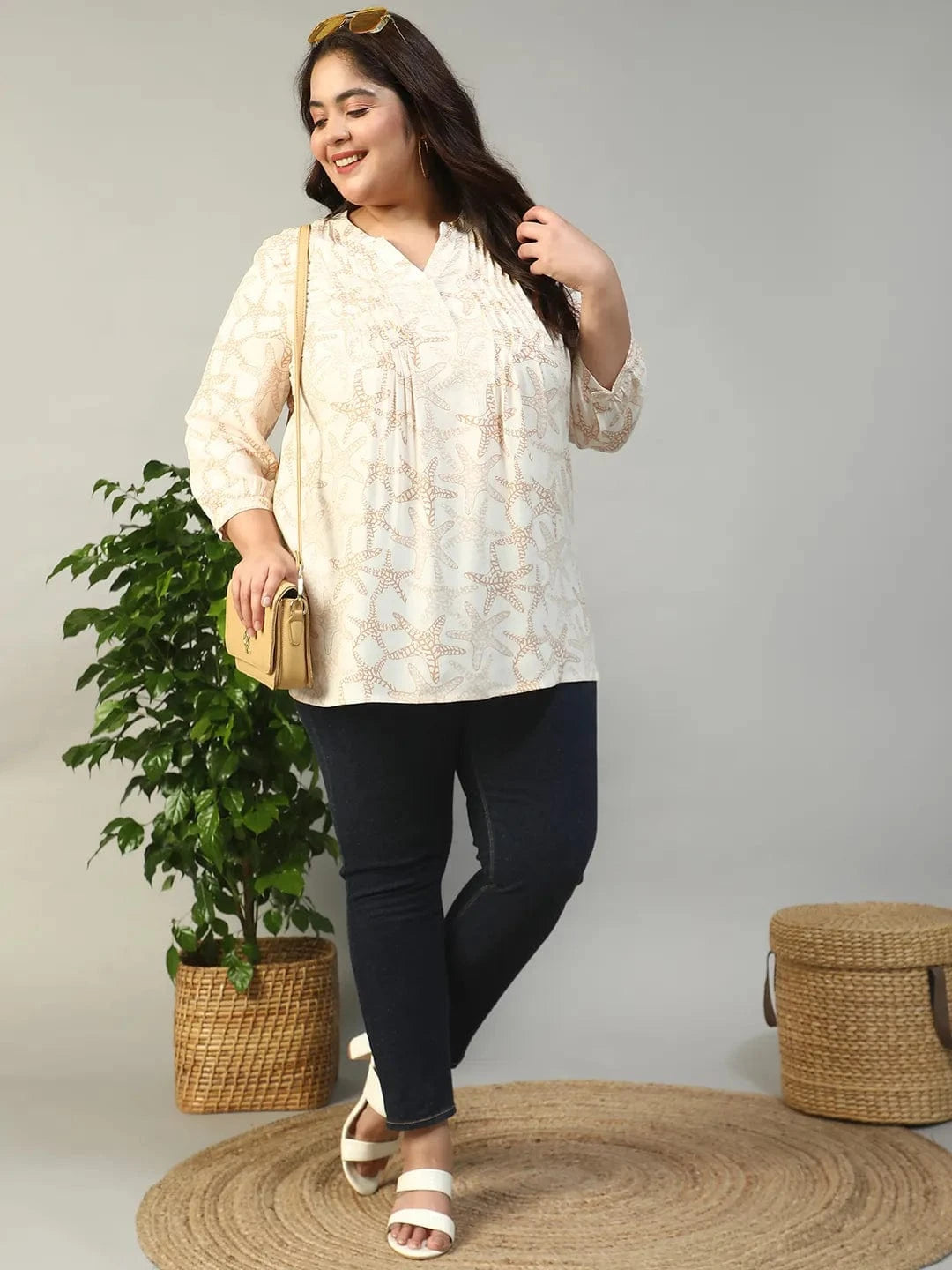 Ethereal Beige Floral Rayon Print Plus Size Women Top With Button Front, Pleated Details, And Long Sleeves.