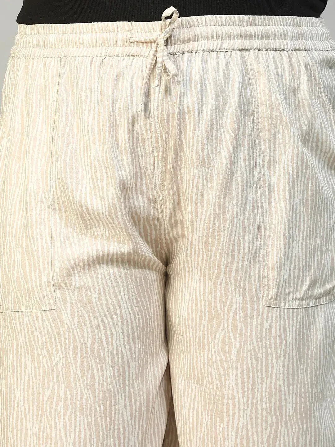 Beige Elasticated With Tie -Up Detail Rayon Dot Print Plus Size Women Flare Pant