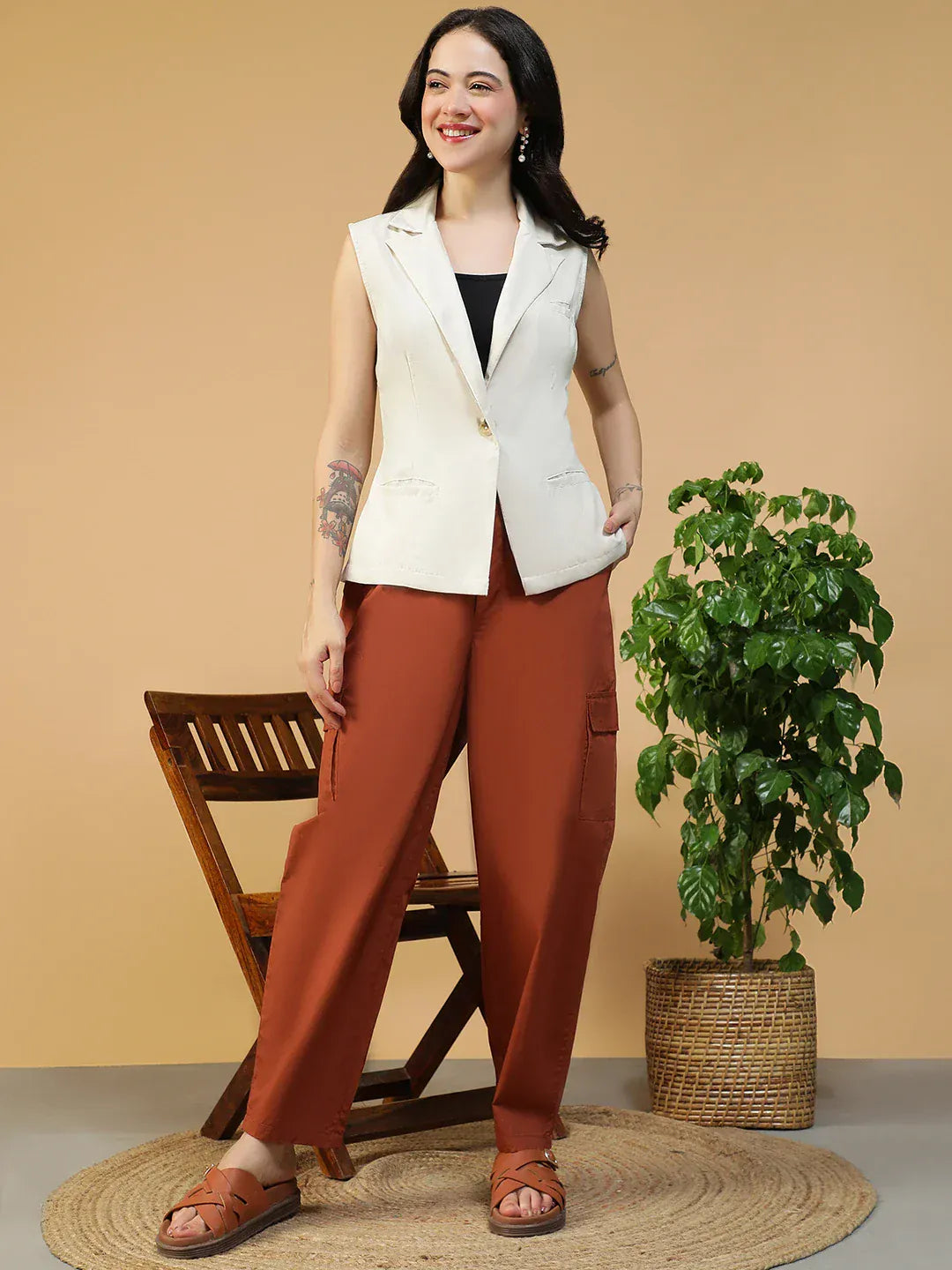 Women Off White Sleeveless Blazer with Open Collar & Front Pockets