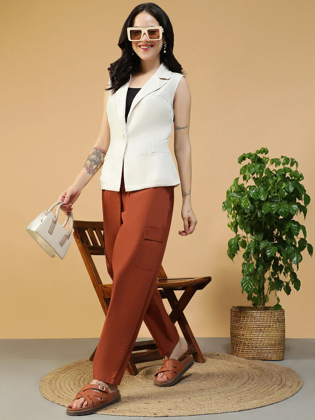 Women Off White Sleeveless Blazer with Open Collar & Front Pockets