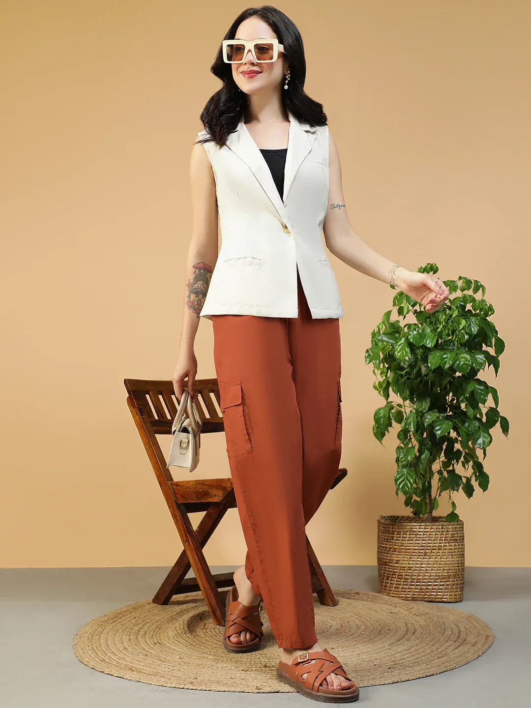 Women Off White Sleeveless Blazer with Open Collar & Front Pockets