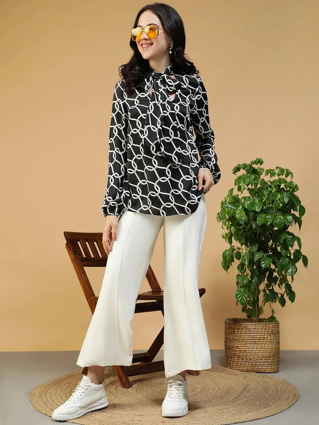 Quaint Black Abstract Print Round Neck With Tie-Up Detail Long Sleeve Women Top