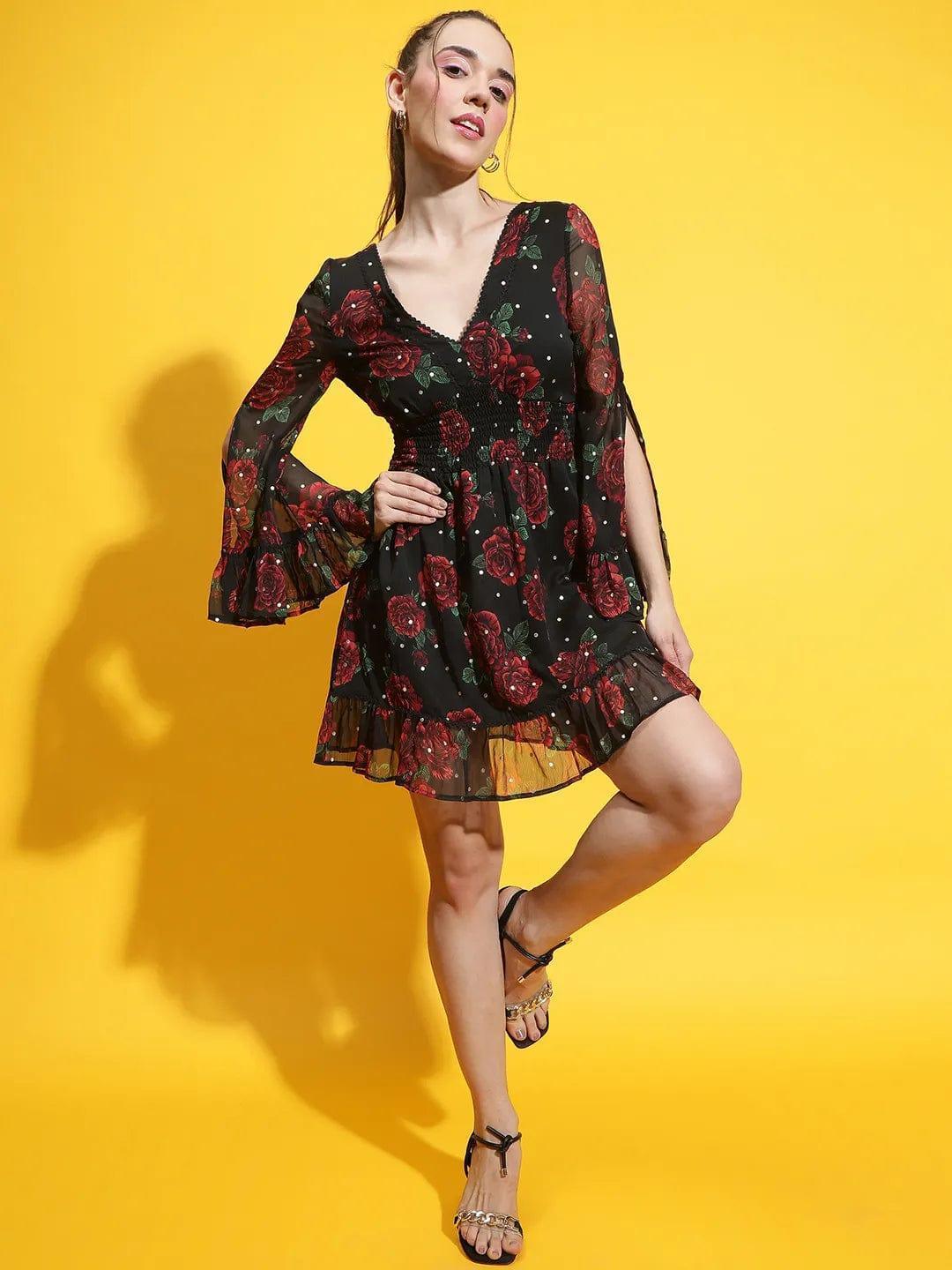 Oxolloxo black rose print lace dress with long bell sleeves and ruffled hem on model