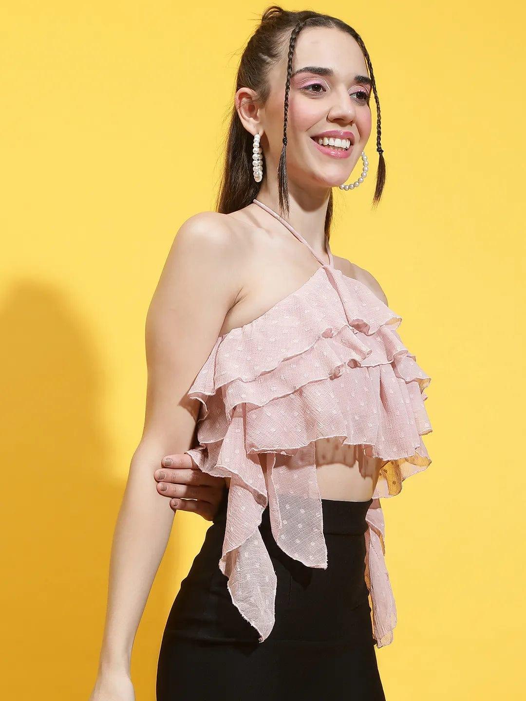Oxolloxo pink halter neck crop top with layered ruffles worn by smiling woman